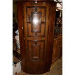 A walnut bowfront standing corner cupboard, 90cm wide. Condition Report: Height 178.