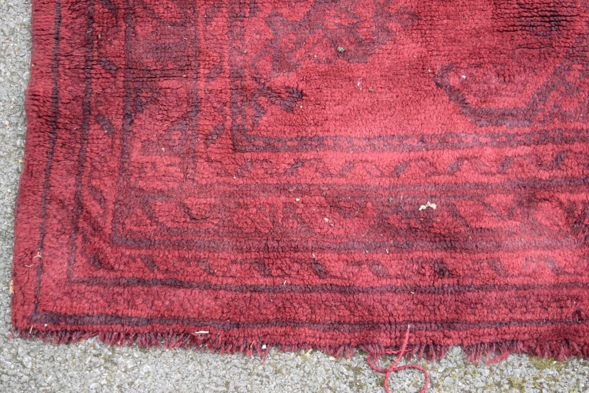 A Turkish Kelleh narrow carpet, with allover geometric design on a rich red field, 383 x 153cm. - Image 11 of 16