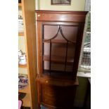 A near pair of Edwardian mahogany and inlaid display cabinets, 66cm wide.