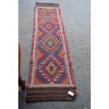 A narrow Baluch flatweave runner, 234 x 63cm.