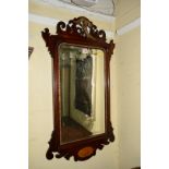 An antique mahogany, inlaid and parcel gilt fret framed wall mirror, 90.5cm high.