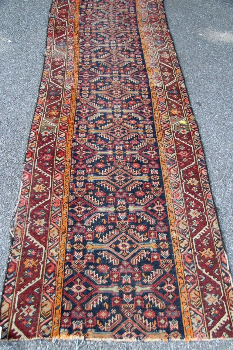 A fragmented North West Persian long runner; together with a small Hamadan mat, largest 369 x 81cm. - Image 12 of 32