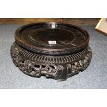 A very large Chinese 19th century pierced and carved hardwood stand, aperture approx 29cm.