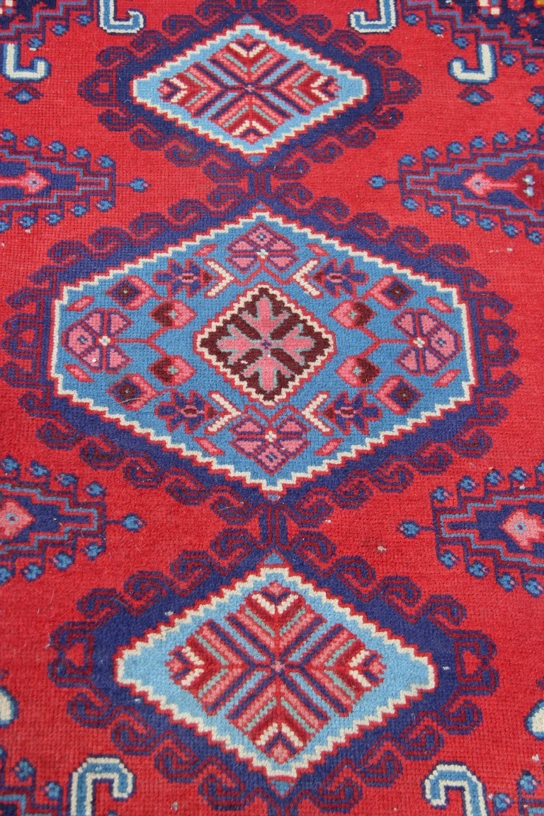 A North West Persian triple medallion rug on a red field, 151 x 105cm. - Image 12 of 16