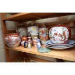 A mixed group of oriental pottery and porcelain.
