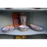 *WITHDRAWN FROM SALE*A collection of ten items of Quimper ware pottery, together with price guide.
