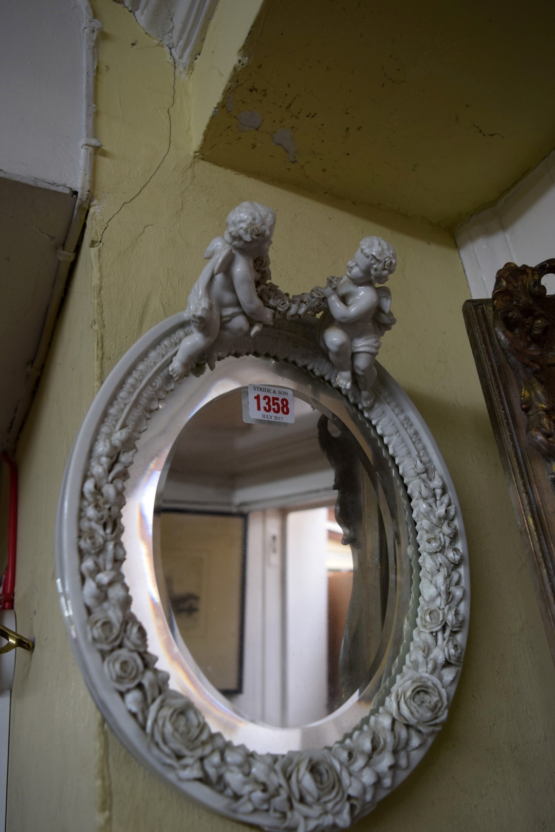 A Sitzendorf blanc de chine oval wall mirror, with cherub surmount, 33cm high. - Image 2 of 8