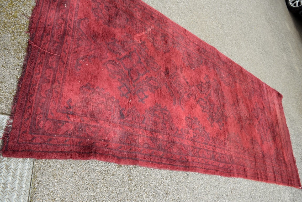 A Turkish Kelleh narrow carpet, with allover geometric design on a rich red field, 383 x 153cm. - Image 3 of 16