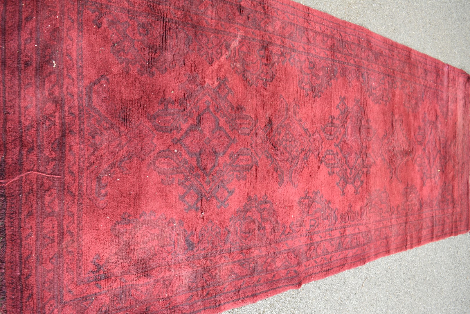 A Turkish Kelleh narrow carpet, with allover geometric design on a rich red field, 383 x 153cm. - Image 5 of 16