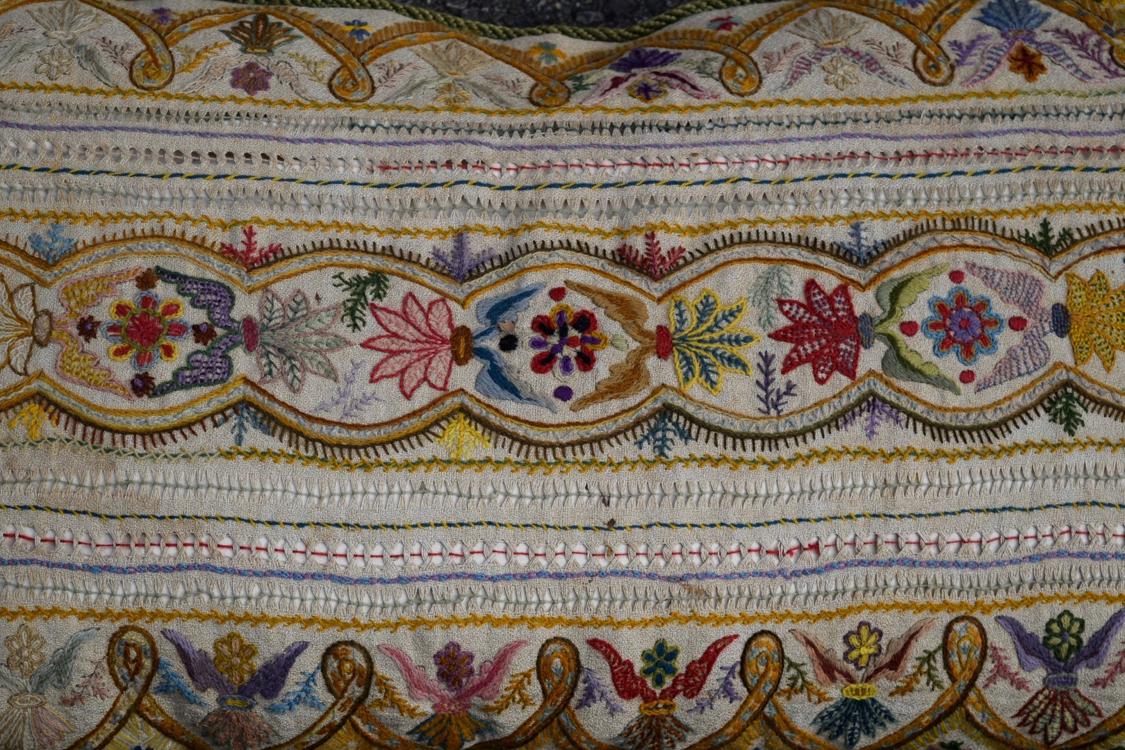 A crewel work cushion with stylised needlework decoration, 92 x 49cm. - Image 6 of 8