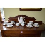 A Royal Albert 'Rocaille' pattern coffee set.