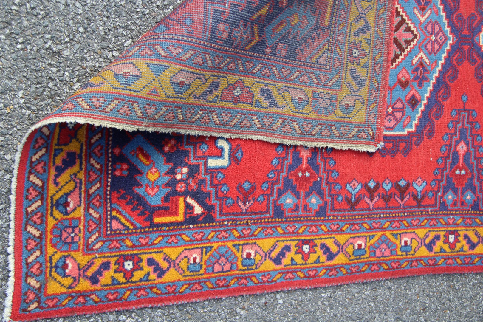 A North West Persian triple medallion rug on a red field, 151 x 105cm. - Image 13 of 16