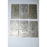 A set of twelve Chinese metal plaques depicting signs of the zodiac, 9.5 x 5cm.