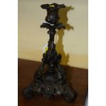 An 18th century style bronze candlestick, 23.5cm high.