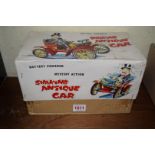 A Made in Japan battery powered 'Shaking Antique Car', boxed.