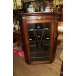 A George III mahogany and line inlaid hanging corner display cupboard, 79.5cm wide.