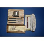 A boxed Parker 61 pen set; together with a boxed Waterman pen; a Ronson Diana lighter,