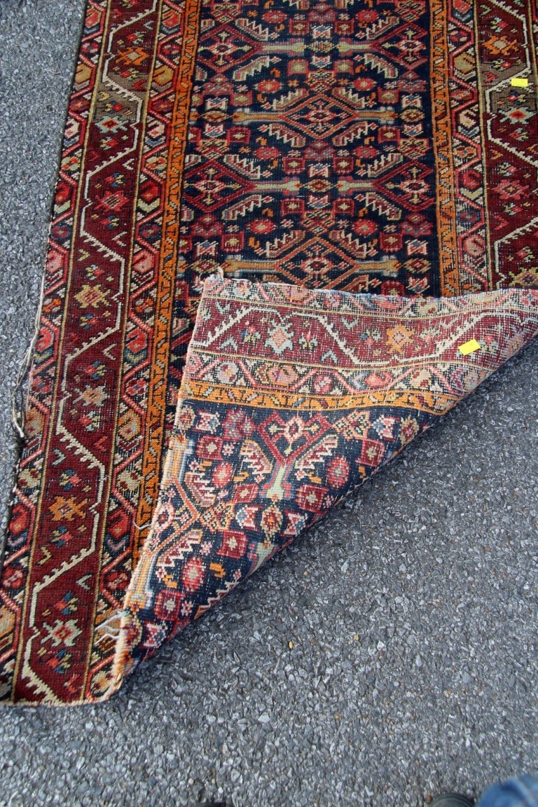 A fragmented North West Persian long runner; together with a small Hamadan mat, largest 369 x 81cm. - Image 19 of 32