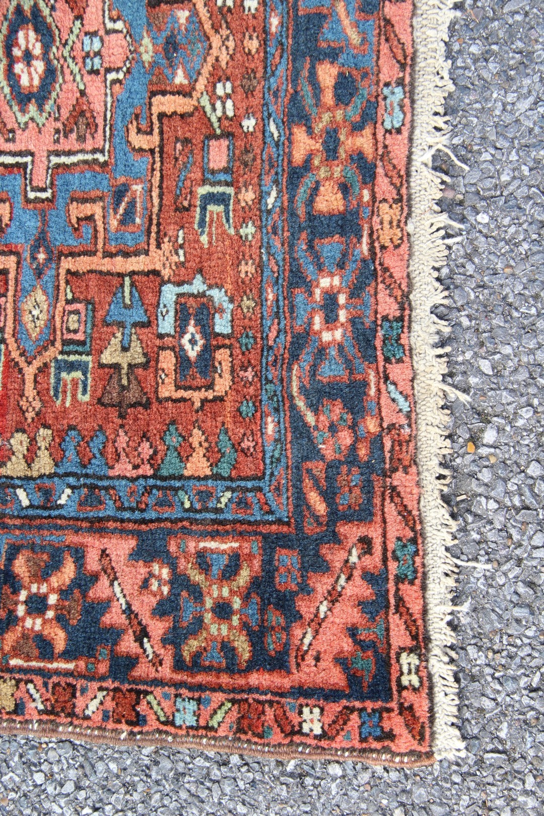 A North West Persian Karaja runner, with seven medallions on a geometric design red field, - Image 6 of 18