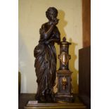 A bronze figure of a classical female, stamped 'F B', 37cm high.