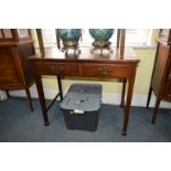 A late Victorian mahogany two drawer side table, labelled Heal & Son Ltd, 91cm wide.