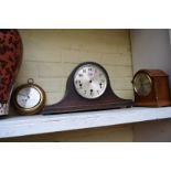 Two old clocks and an aneroid barometer.