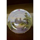 A Royal Worcester cabinet plate, painted with Canterbury Cathedral, by Nicholls, 27.5cm diameter.