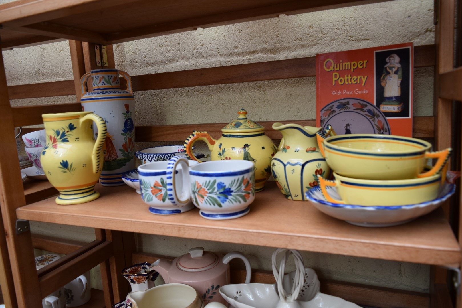 *WITHDRAWN FROM SALE*A collection of ten items of Quimper ware pottery, together with price guide. - Image 3 of 22