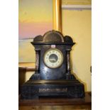 A slate and marble mantel clock, 52cm high.