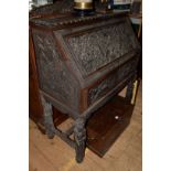 A Chinese carved hardwood bureau, 96cm wide.