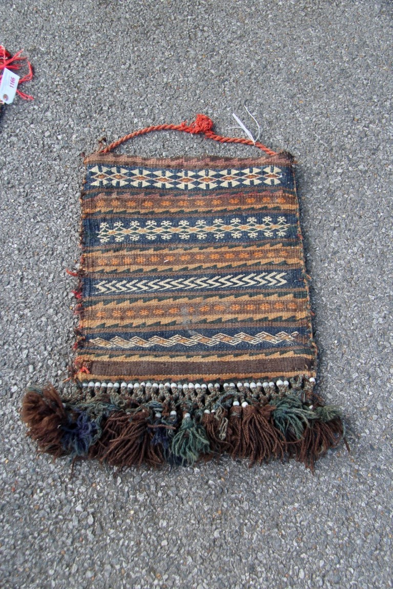 A Moroccan flatweave runner; together with a Baluchi flatweave tribal bag, 165 x 77cm. - Image 16 of 16