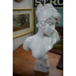 A reconstituted marble/resin bust, 56cm high.