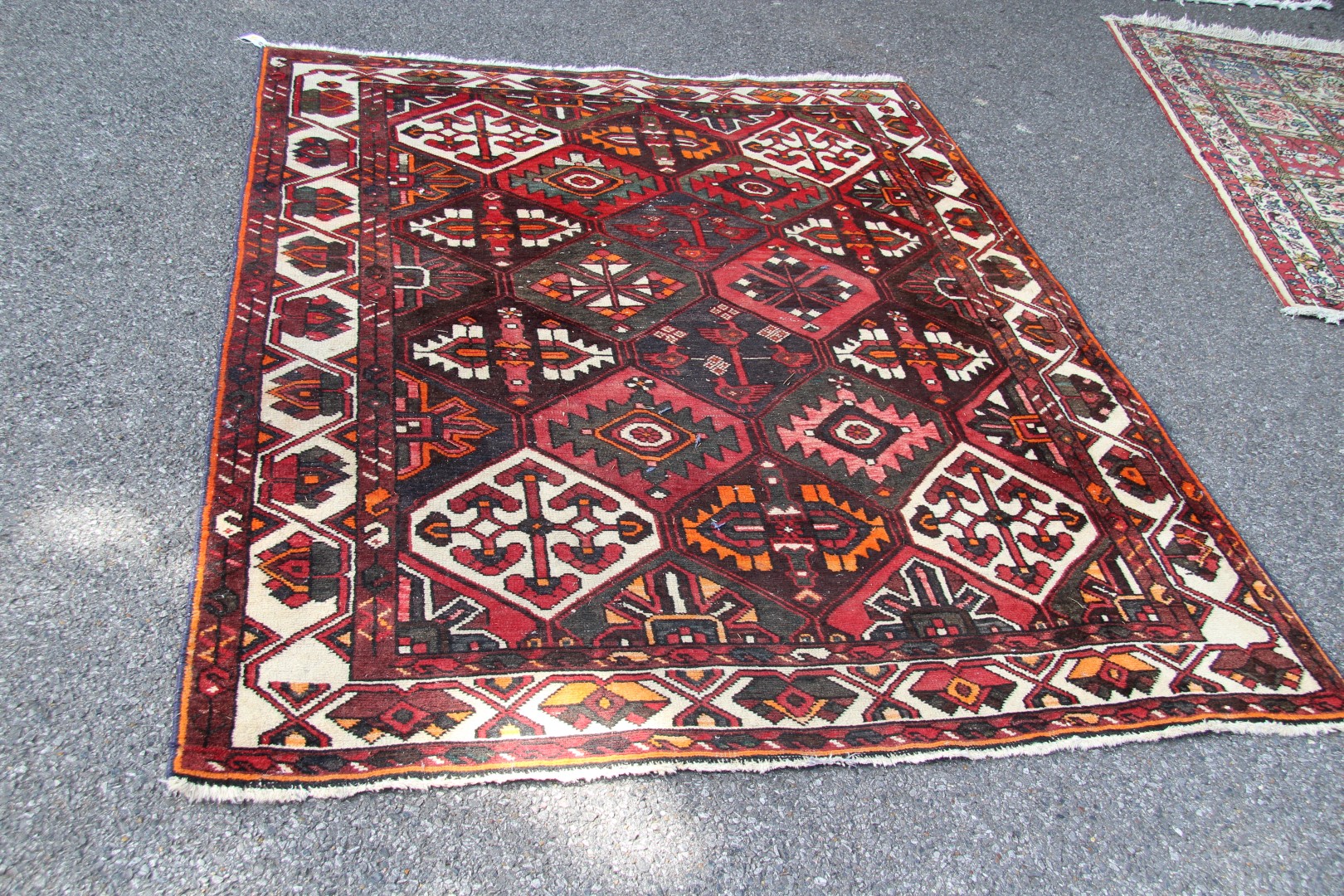 A Persian Bakhtiari rug, with allover garden tile design, 196 x 159cm.