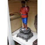A polychrome painted metal model of a Russian fisherman, 40cm.
