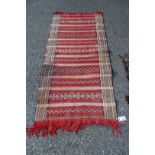 A Moroccan flatweave runner; together with a Baluchi flatweave tribal bag, 165 x 77cm.