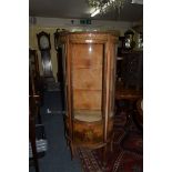 A Louis XVI style mahogany and gilt metal mounted bowfront vitrine,