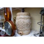 A Victorian Doulton Lambeth stoneware rum barrel, converted to electricity, the barrel 32cm.