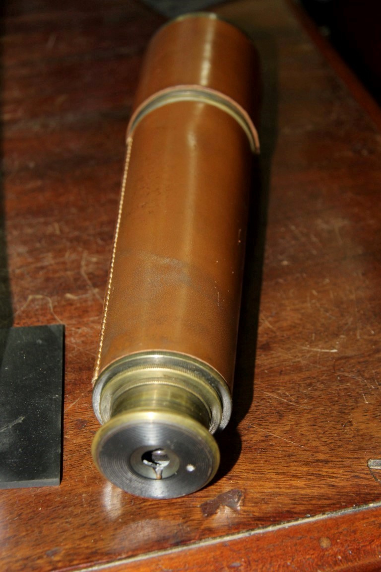 A lacquered brass and leather three drawer telescope, with broad arrow stamp, - Image 13 of 18