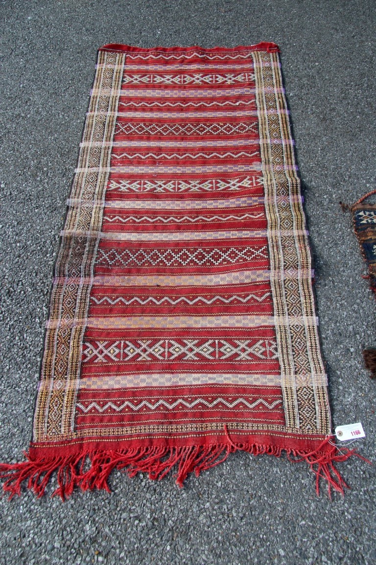 A Moroccan flatweave runner; together with a Baluchi flatweave tribal bag, 165 x 77cm. - Image 3 of 16