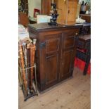 An 18th century oak cupboard, with pair of panelled doors, 76cm wide.