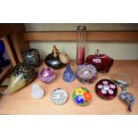 A small quantity of coloured glass paperweights and similar,