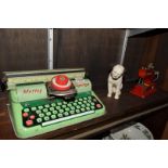 A Mettoy Supertype toy typewriter; together with a similar Vulcon Minor sewing machine;