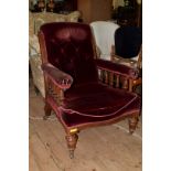 A Victorian mahogany and button upholstered occasional armchair.