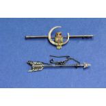 A 9ct gold owl and moon bar brooch, 2.9g; together with an unmarked arrow pin, 7.9g.