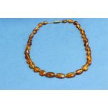 An amber style bead necklace, 9.7g.