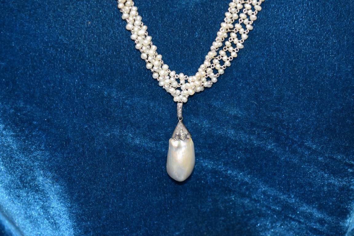 A large Baroque pearl in a mine cut diamond set mount on an associated four strand freshwater pearl - Image 12 of 19