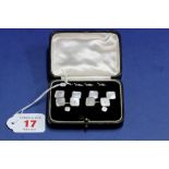 A set of mother of pearl and seed pearl 9ct white gold cufflinks, studs and buttons, in fitted case,