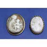 A large carved shell cameo of a Madonna and child,