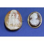 A large carved shell cameo of the three graces in a 9ct gold brooch/pendant mount;