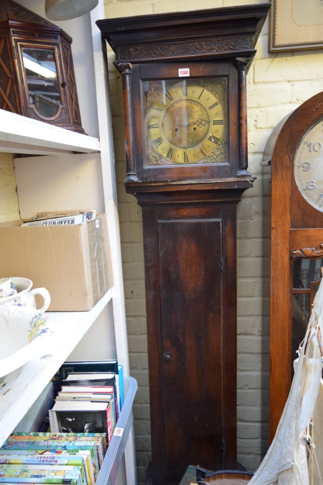 An oak longcase clock, the 10in square brass dial inscribed 'Geo Hewitt, Marlbro', 208cm high,